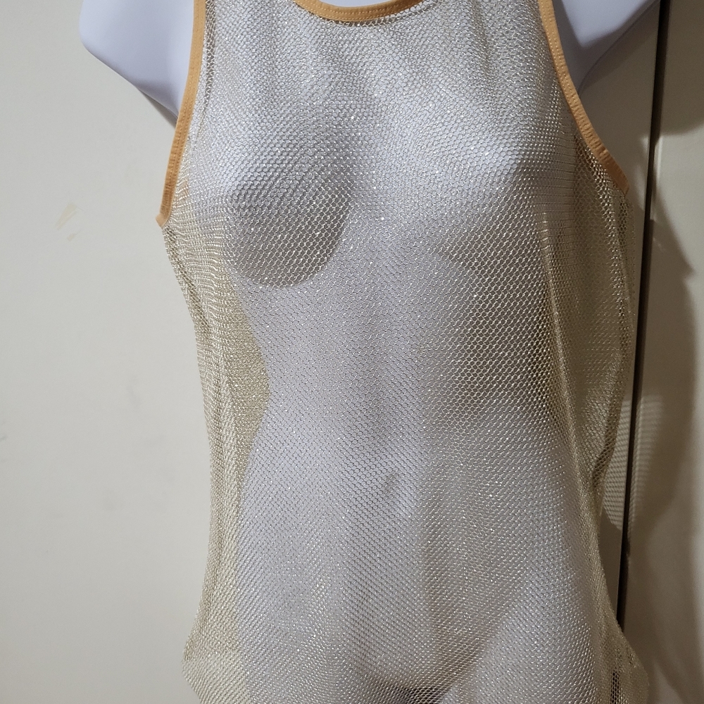Free people size medium tank top  gold